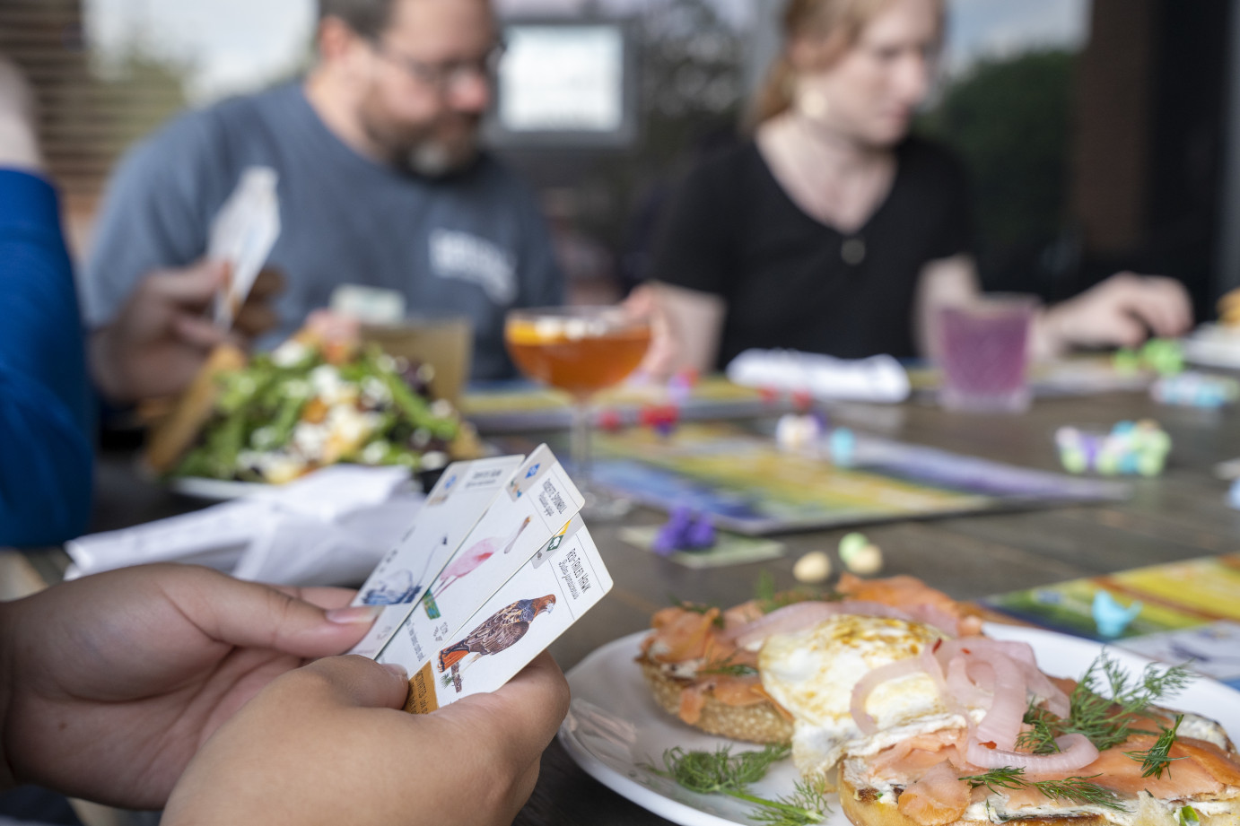 Exterior, guests enjoying a board game